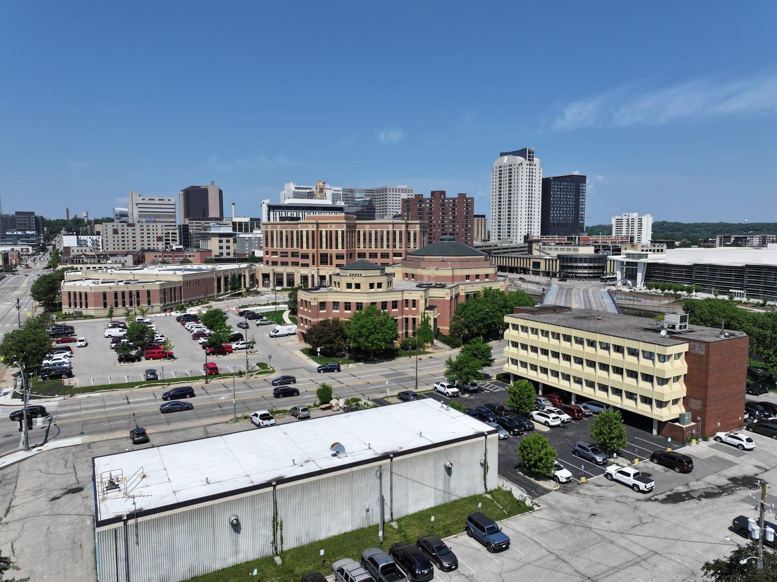 Aerial view of Ironwood Square with the downtown Rochester skyline
